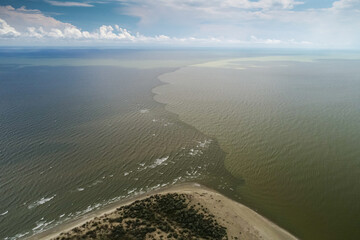 Danube river merge point with Black sea. Aerial view over this iconic landscape from Danube Delta...