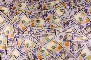 Fototapeta premium Background of one hundred dollar banknotes