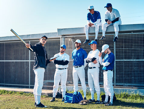 Coaching, sports and teamwork with baseball player on field for training, learning and discussion. Solidarity, support and listening with group of people and practice for competition, pitch and goals