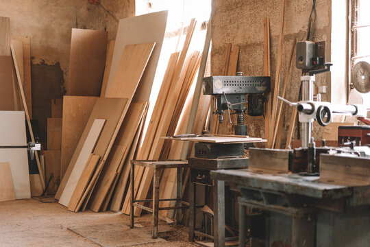Carpentry shop interior with wood and tools