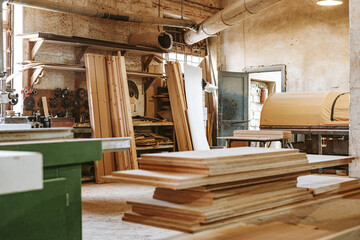 Pile of wooden boards in carpenter's shop