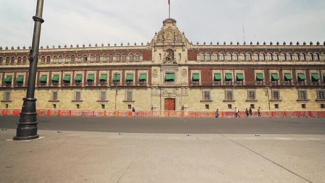  Z&oacute;calo (Plaza de la Constitucion) is the common name of the main square in central Mexico City with a giant mexican flag. Slow motion steadicam footage.