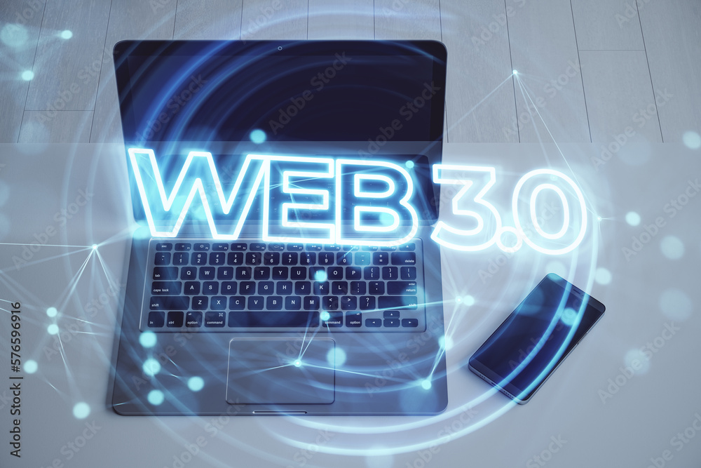 Aufkleber Web 3.0 - a new generation of the Internet, using blockchain and AI, modern technologies IoT. Close up of laptop and smartphone with hologram on desktop and blurry background. Double exposure.