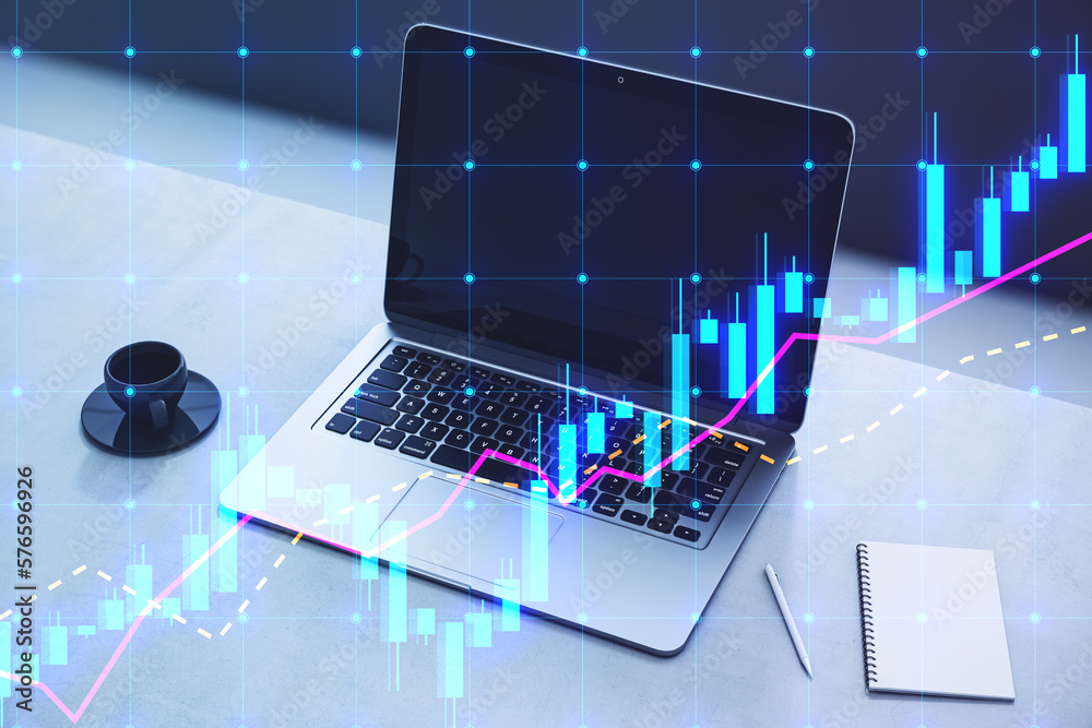 Poster close up of laptop on desktop with coffee cup, notepad and glowing candlestick forex chart hologram 