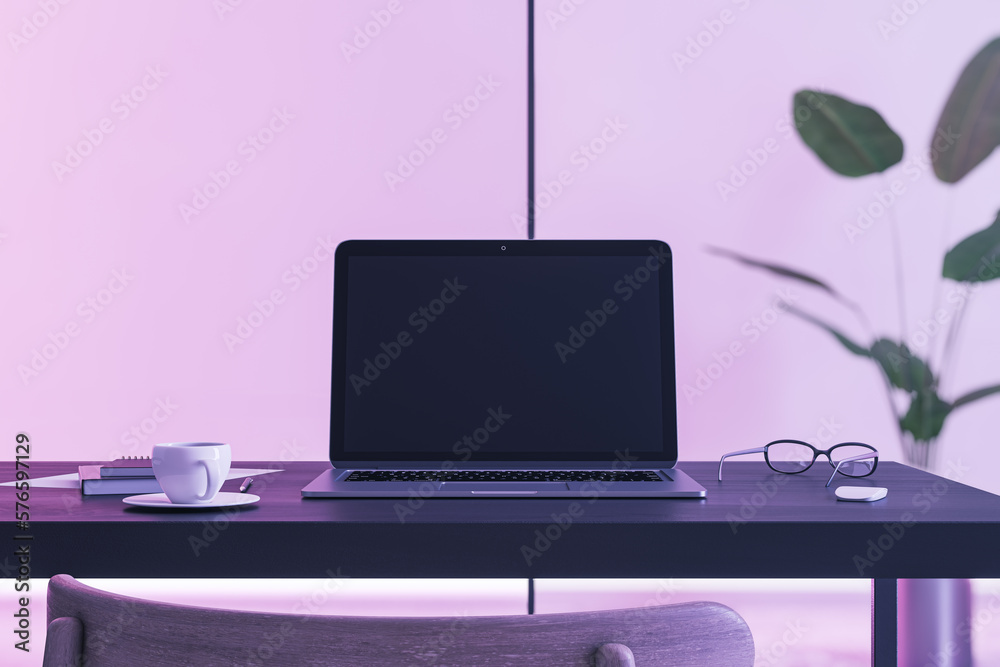 Poster Front view on blank black modern laptop screen with space for web design or web site on dark work table with coffee mug and eyeglasses on purple wall background. 3D rendering, mock up