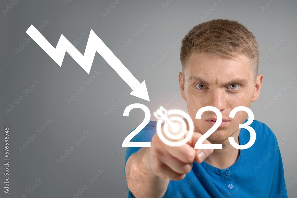 Poster Business man with 2023 numbers on virtual screen