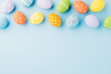 Colorful easter eggs isolated on blue background with copy space, Funny decoration, Creative...