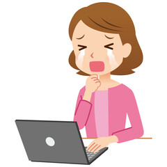 パソコンを操作する女性　主婦　涙