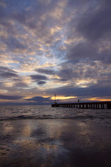 Landscape with clouds sea sky and a bridge in north of tuscany italy