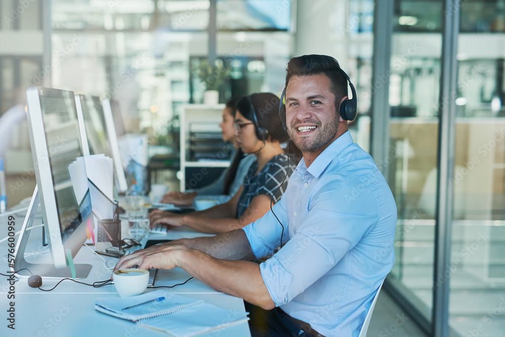 Poster delivering outstanding customer support day after day. portrait of a happy and confident young man w