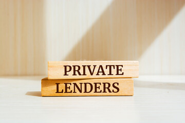 Wooden blocks with words 'PRIVATE LENDERS'. Business concept