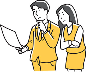 書類を見る男女社員