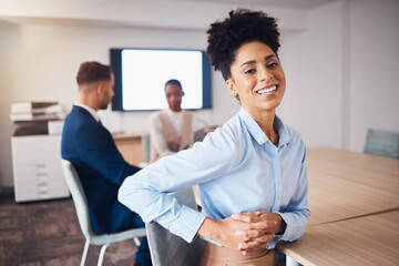 Corporate, happy and portrait of a woman in a meeting, workshop or seminar with colleagues. Business, cheerful and employee laughing in a boardroom for training, a conference and group coworking