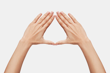 Female hands forming a triangle, symbol of women, feminist struggle. Conceptual feminism, female ...