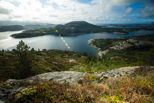 Landscape of fjords on a cloudy day.