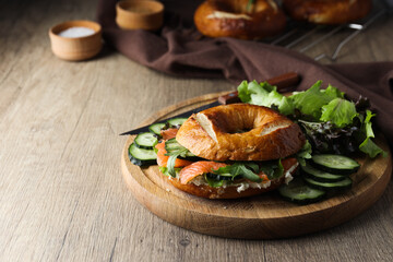 Concept of delicious food - tasty bagel sandwich, space for text