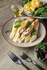 Concept of tasty food, thin pancakes with filling