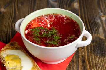 Borscht cooked with red beetroot with sour cream