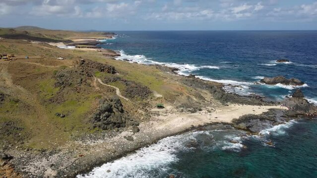 tour the beautiful coastline of arikok national park, Aruba, from the air.