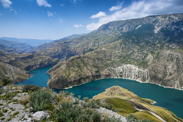 Fototapeta na wymiar Sulak Canyon. Beautiful view of the mountains and the blue river on a sunny summer day. Dagestan