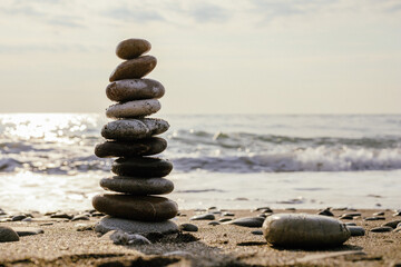 Balanced cairn on the beach