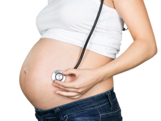 Big belly of a pregnant woman with stethoscope