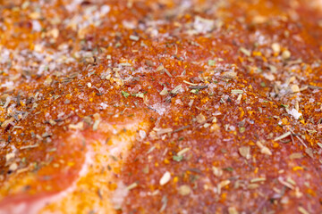Pork meat pieces marinated with spices and salt