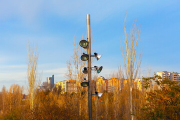 Pillar with street lamps . Street illumination in the park 