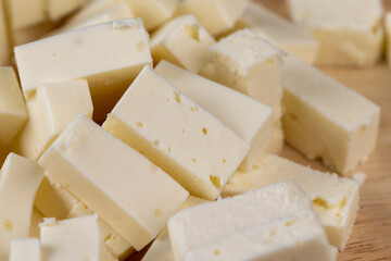 sliced soft cheese that is used for salads