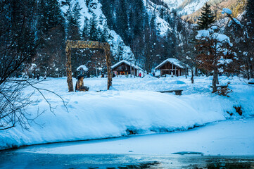 Kranjska Gora lake and snowy panorama. Slovenia