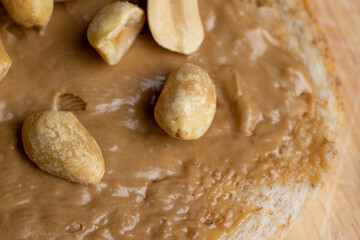 Fototapeta na wymiar Chocolate peanut paste for a quick breakfast