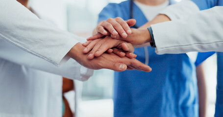Doctors, hands or stack in teamwork, collaboration or motivation for healthcare, wellness or medical life insurance. Men, women or excited nurses in team building, support or solidarity in diversity