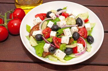Greek salad with fresh vegetables closeup
