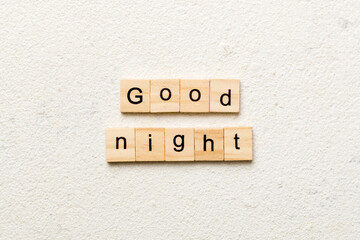 good night word written on wood block. good night text on table, concept
