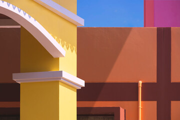 Street minimal exterior architecture background, part of yellow arch door with colorful geometric...