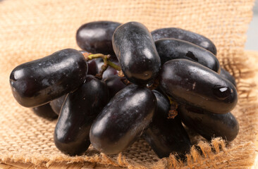 Natural organic different types of fresh ripe juicy grapes and space for text on table. top view, Agriculture concepts.