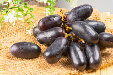 Natural organic different types of fresh ripe juicy grapes and space for text on table. top view, Agriculture concepts.