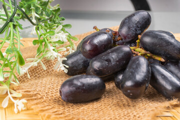 Natural organic different types of fresh ripe juicy grapes and space for text on table. top view, Agriculture concepts.