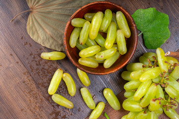 Natural organic different types of fresh ripe juicy grapes and space for text on table. top view, Agriculture concepts.