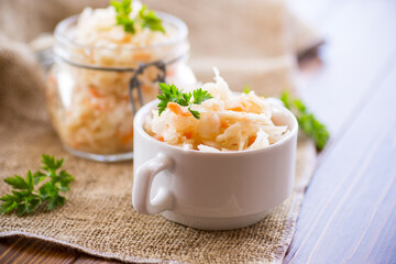 Sauerkraut with carrots and spices in a bowl