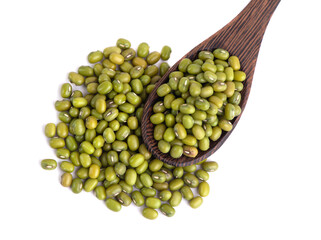 Dry green beans on a white background. Organic raw green mung beans. Vigna radiata.
