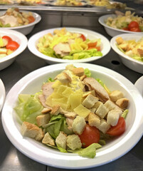 Caesar salad with chicken and crackers