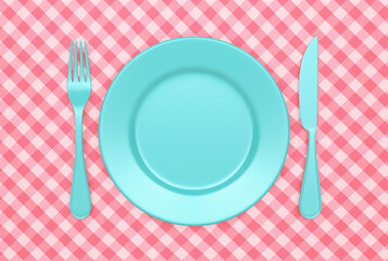 Blue plate with fork and knife on a pink checkered tablecloth. Top view