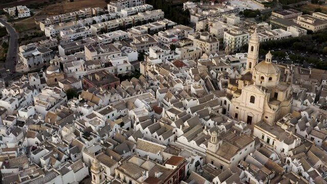 Aerial view of Ostuni old town with cathedral, Brindisi, Apulia, Italy.