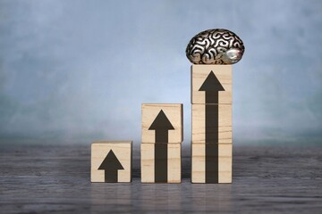 Brain and upward arrow. Upgrade mindset, self-improvement and personal development concept