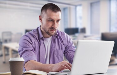 Busy Businessman Working in office on computer