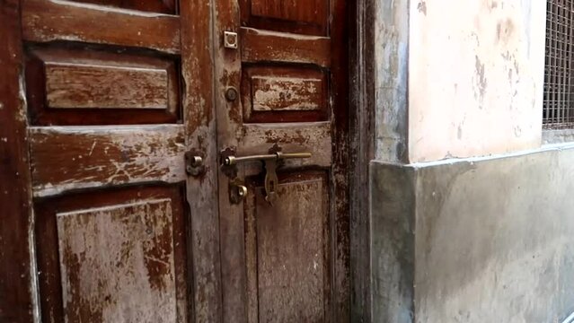 Old wooden door in Mji Mkongwe, Zanzibar. Typical house entrance, handheld