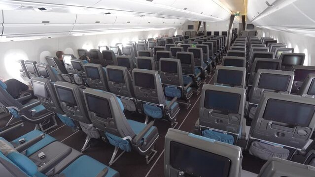 Empty Rows Of Economy Seats On An Aircraft Before Boarding In The Airport. - wide