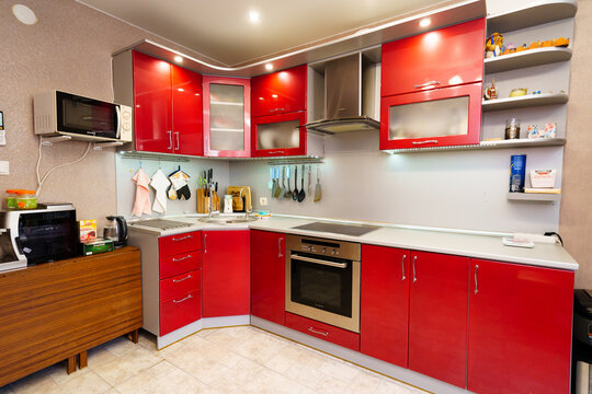 kitchen interior with red built-in furniture. non-modern furniture.