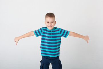 portrait of child. handsome little boy in jeans wear. 8 years old kid.